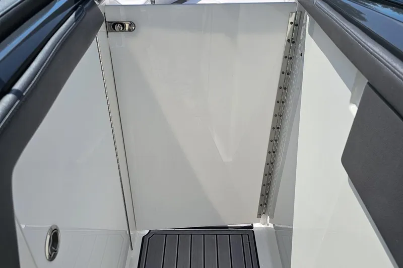 Slide: The Image of 2020 Formula 330 Crossover Bowrider interior door and flooring detail. - 87