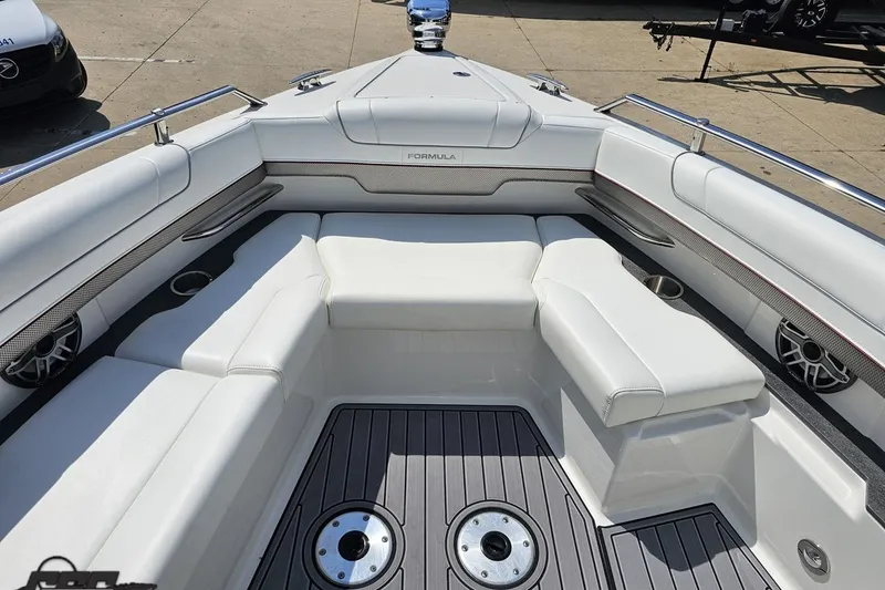Slide: The Image of 2020 Formula 330 Crossover Bowrider interior with white seating and sleek design. - 92