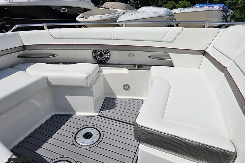 Slide: The Image of 2020 Formula 330 Crossover Bowrider interior with white seating and sleek design. - 94