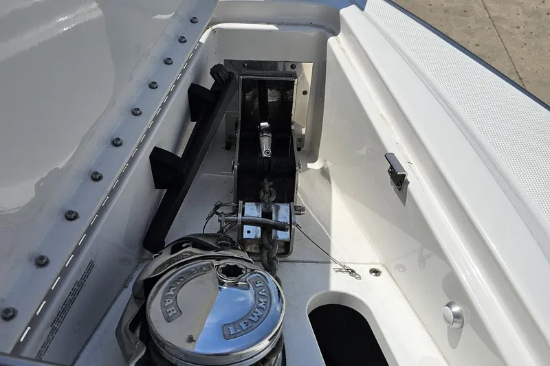Slide: The Image of 2020 Formula 330 Crossover Bowrider anchor compartment with Lewmar windlass system. - 96
