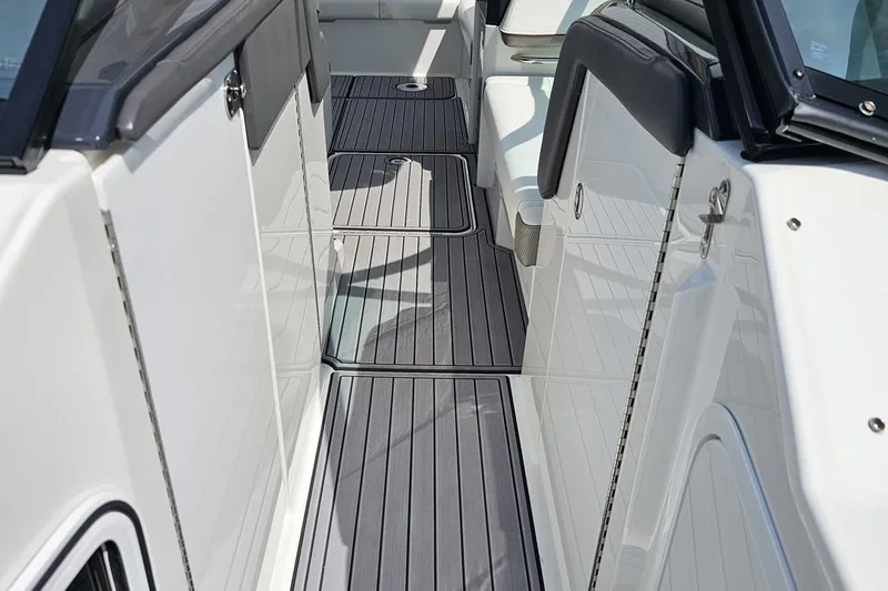 Slide: The Image of 2020 Formula 330 Crossover Bowrider interior with sleek, modern design and seating. - 98