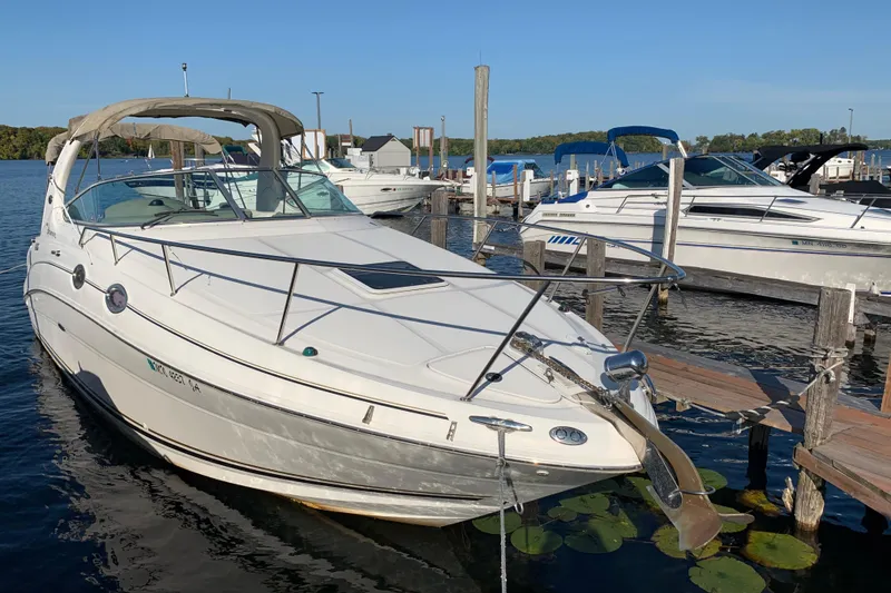 The Image of 2001 Sea Ray Sundancer 280 docked at marina on a sunny day. - 1