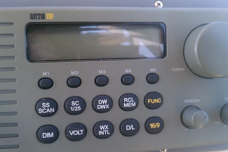 Slide: The Image of VHF radio control panel on 2001 Sea Ray Sundancer 280 boat. - 14