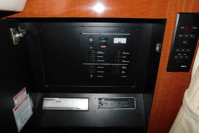 Slide: The Image of Electrical control panel inside 2001 Sea Ray Sundancer 280 boat cabin. - 20