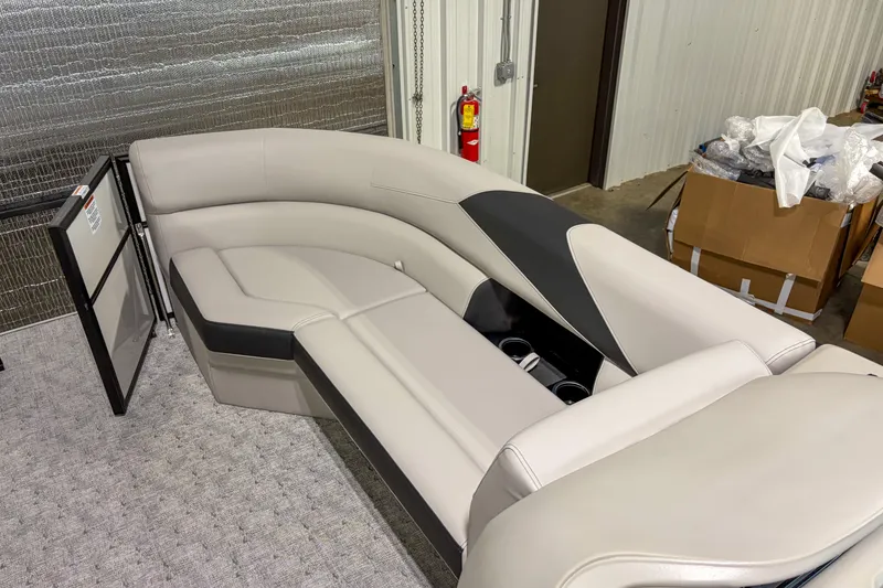 Slide: The Image of 2026 Trifecta 24RF LE boat interior with luxurious seating and cup holders. - 11