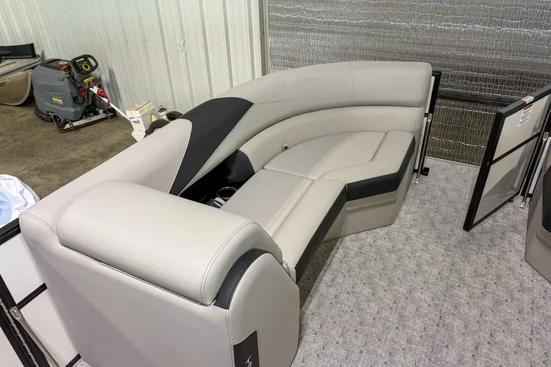 Slide: The Image of 2026 Trifecta 24RF LE pontoon boat interior with plush seating and modern design. - 12
