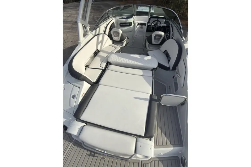 Slide: The Image of 2026 Crownline Eclipse E255 boat interior with luxurious seating and modern design. - 11