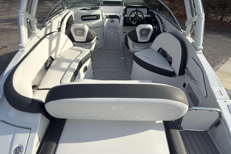 Slide: The Image of 2026 Crownline Eclipse E255 boat interior with luxurious seating and modern design. - 5