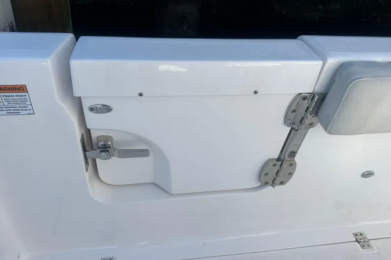 Slide: The Image of 2023 Sea Fox 268 Commander boat hatch with latch and hinge detail. - 29