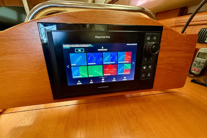 Slide: The Image of Raymarine navigation system on 2007 Hunter 44 Deck Salon yacht dashboard. - 35