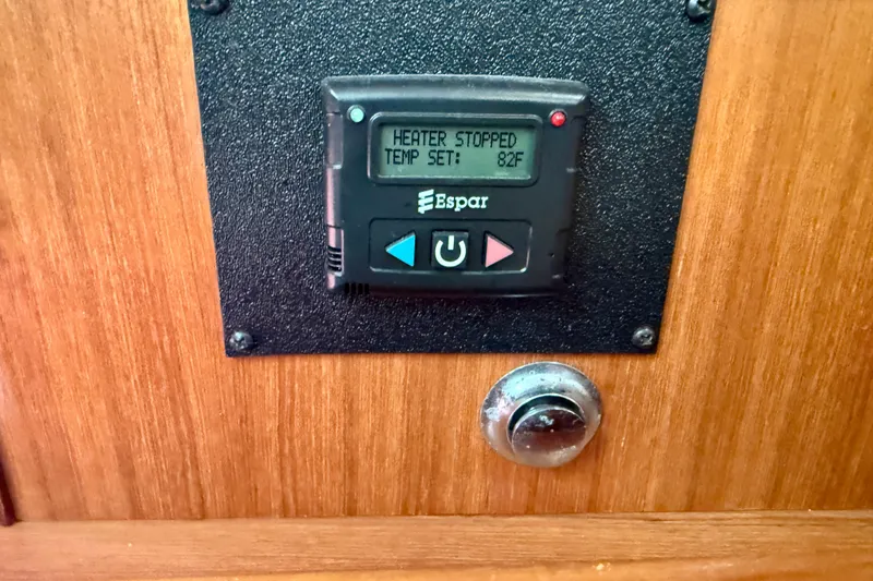 Slide: The Image of Espar heater control panel on 2007 Hunter 44 Deck Salon, temperature set at 82°F. - 36
