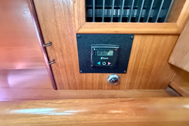 Slide: The Image of Espar central diesel heating system control. Set desired temp and the entire yacht will stay warm and dry! - 37