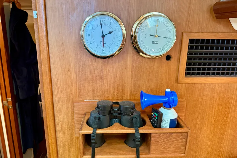 Slide: The Image of DUET clock, barometer, binoculars, and air horn. - 48