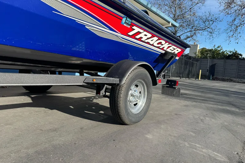 Slide: The Image of 2017 Tracker Pro Team 175 TF boat on trailer, blue and red design. - 5