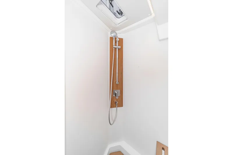 Slide: The Image of Shower area in 2022 Beneteau Oceanis Yacht 54, featuring sleek design and modern fixtures. - 20