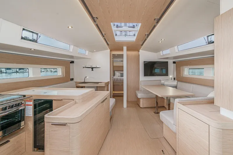 Slide: The Image of Luxurious interior of 2022 Beneteau Oceanis Yacht 54 with modern design and ample natural light. - 4
