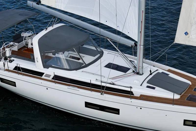 Slide: The Image of 2022 Beneteau Oceanis Yacht 54 sailing on open water, showcasing sleek design and modern features. - 41