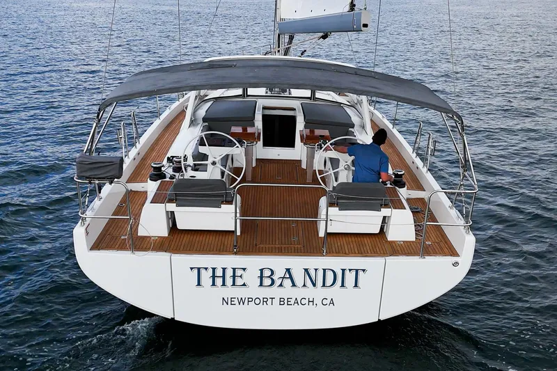 Slide: The Image of 2022 Beneteau Oceanis Yacht 54 sailing in Newport Beach, CA, with a spacious deck. - 44