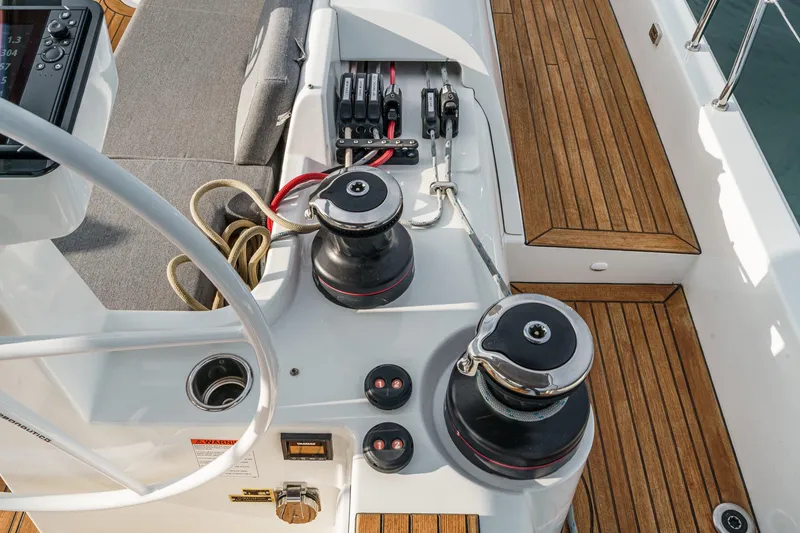 Slide: The Image of Cockpit of 2022 Beneteau Oceanis Yacht 54 with winches and teak decking. - 59