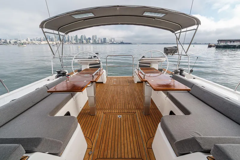 Slide: The Image of Luxurious 2022 Beneteau Oceanis Yacht 54 deck with city skyline view. - 67