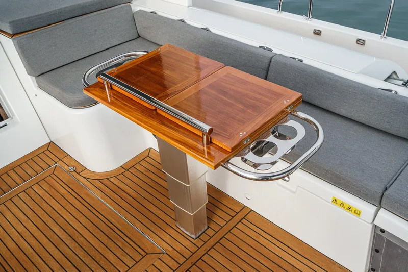 Slide: The Image of Luxurious teak deck and seating area on 2022 Beneteau Oceanis Yacht 54. - 71