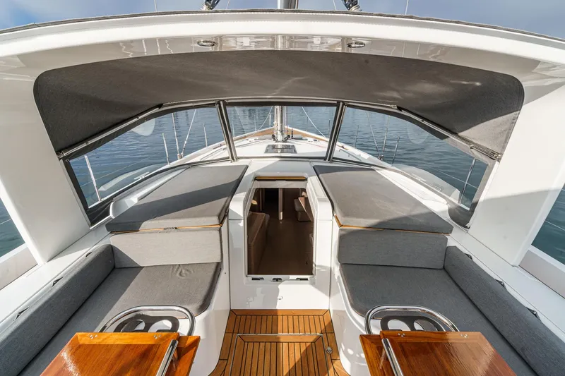 Slide: The Image of Luxurious 2022 Beneteau Oceanis Yacht 54 cockpit with comfortable seating and elegant design. - 74