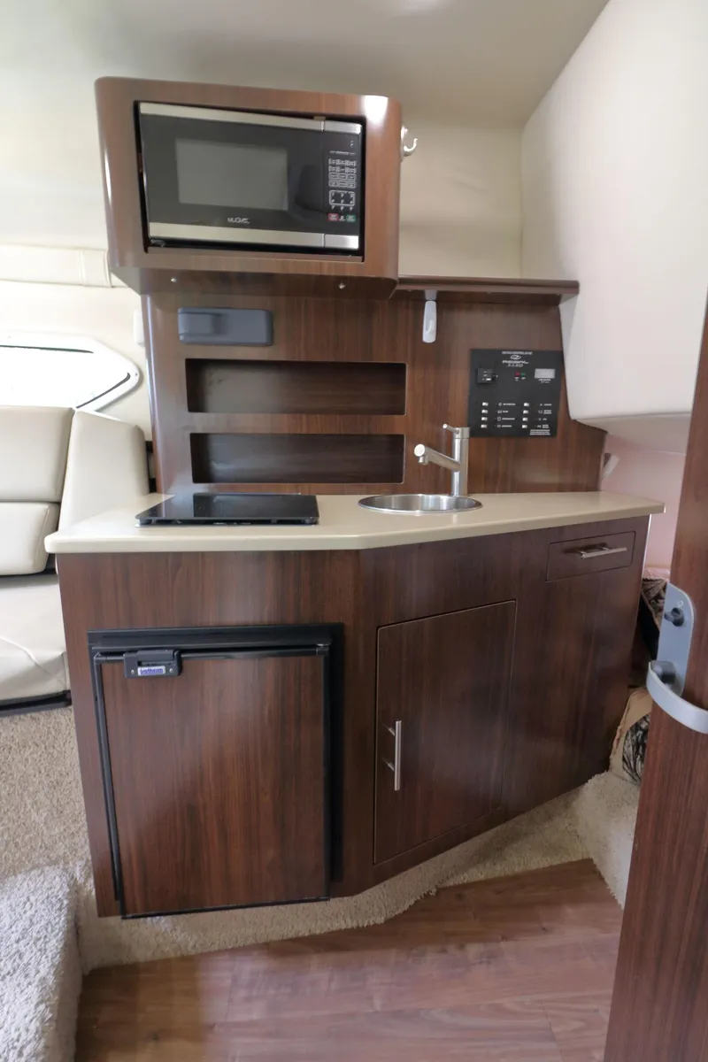 Slide: The Image of Galley in a 2018 Regal 26 Express yacht. - 20