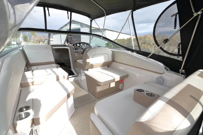 Slide: The Image of Interior of a 2018 Regal 26 Express boat with seating area. - 28