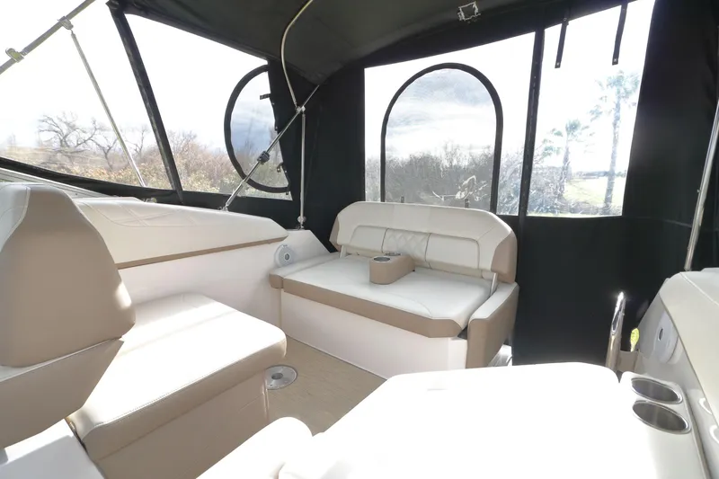 Slide: The Image of Interior of a 2018 Regal 26 Express boat with seating area. - 30
