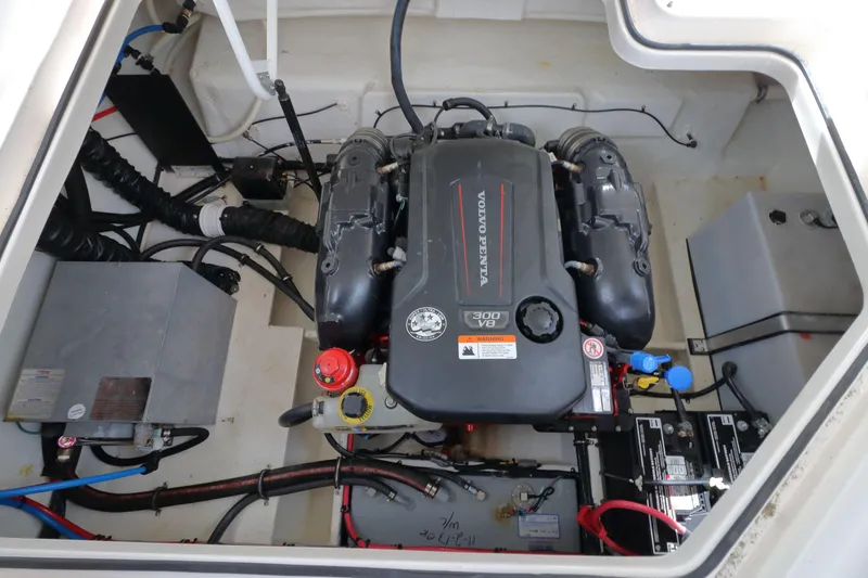 Slide: The Image of Engine compartment of a 2018 Regal 26 Express boat with Volvo Penta engine. - 40
