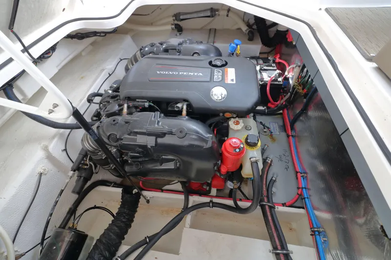 Slide: The Image of Engine compartment of a 2018 Regal 26 Express boat with Volvo Penta engine. - 42