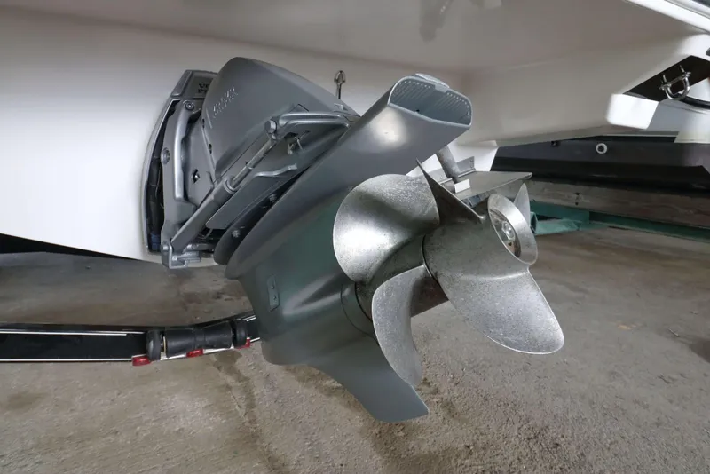 Slide: The Image of 2018 Regal 26 Express boat propeller and stern drive close-up. - 44