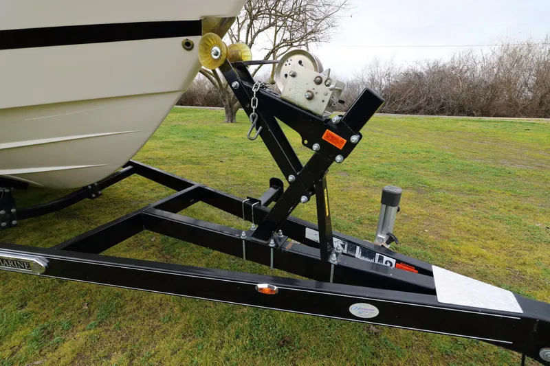 Slide: The Image of Regal 26 Express 2018 on trailer, close-up of bow area. - 9