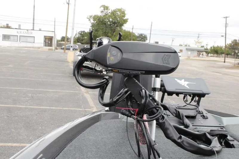 Slide: The Image of 2026 Skeeter ZXE21 boat with advanced trolling motor in a parking lot. - 13