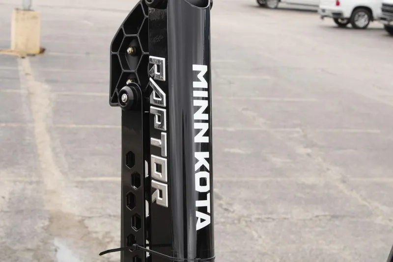 Slide: The Image of Minn Kota Raptor anchor on 2026 Skeeter ZXE21 boat in parking lot. - 20