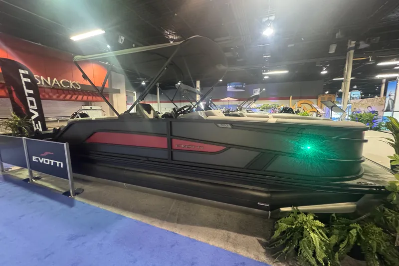 The Image of 2026 Evotti 521QL boat displayed at an indoor exhibition with vibrant lighting. - 0