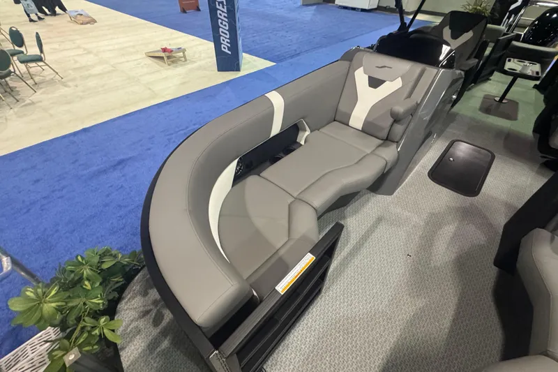 Slide: The Image of Luxurious seating in 2026 Evotti 521QL boat at a trade show. - 2