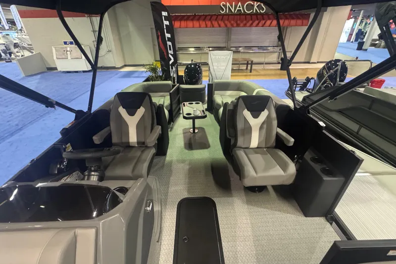 Slide: The Image of Interior of 2026 Evotti 521QL boat with modern seating and helm. - 5