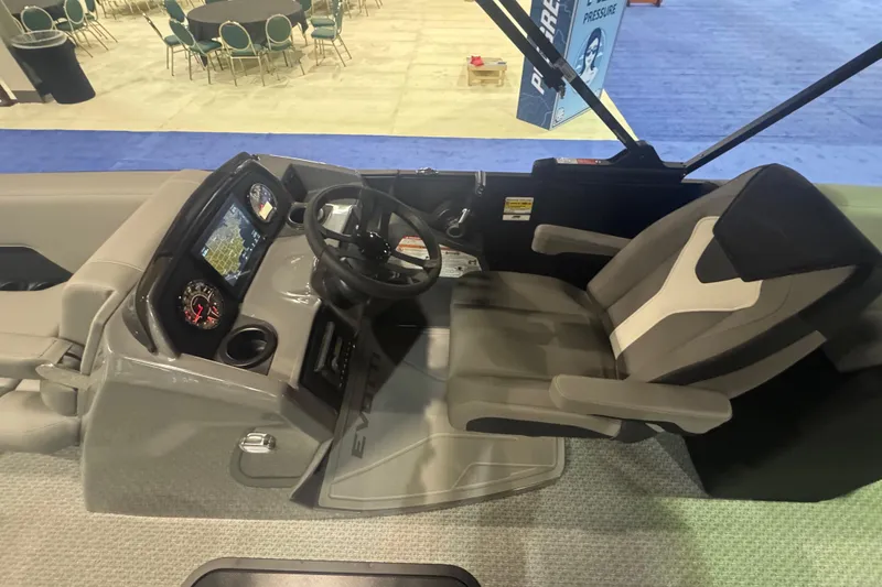 Slide: The Image of 2026 Evotti 521QL boat cockpit with steering wheel, dashboard, and comfortable seating. - 6