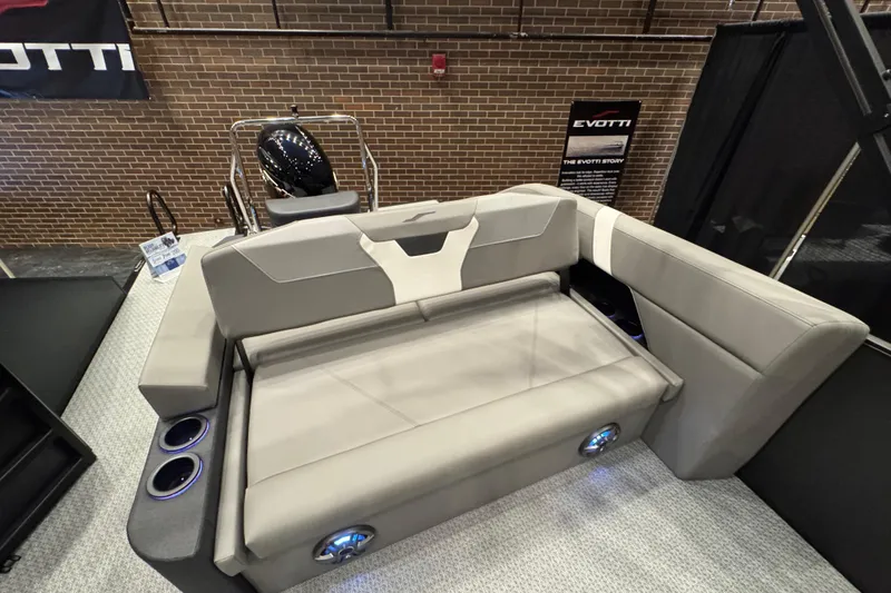 Slide: The Image of Luxurious seating on 2026 Evotti 523CS boat with modern design and cup holders. - 8