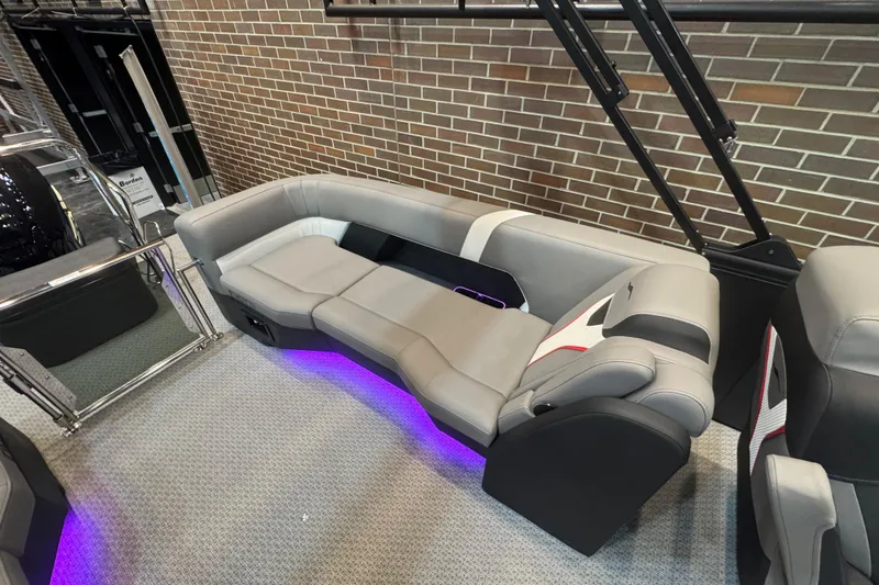 Slide: The Image of Luxurious seating in 2026 Evotti 725QL boat with ambient purple lighting. - 10