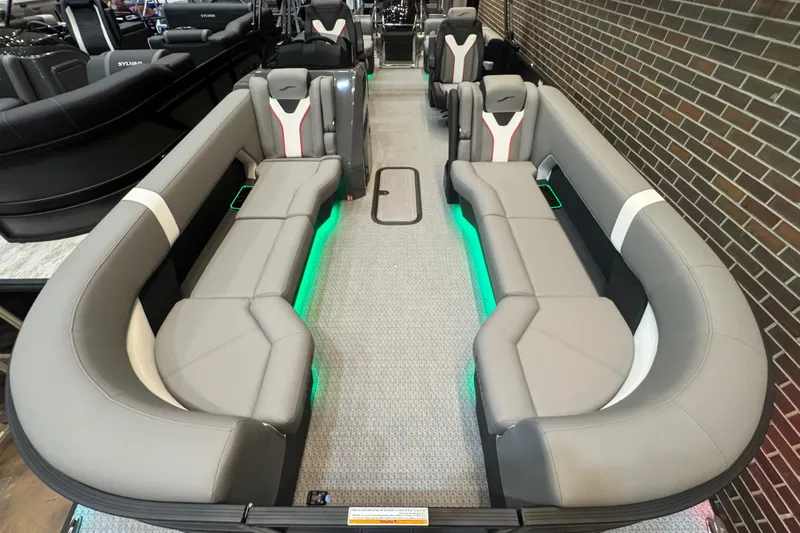 Slide: The Image of Luxurious 2026 Evotti 725QL boat interior with sleek gray seating and ambient lighting. - 2