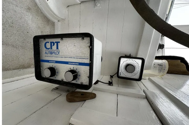 Slide: The Image of CPT Autopilot system on 2005 Custom Sail-Assisted Trawler, featuring rudder and deadband controls. - 28