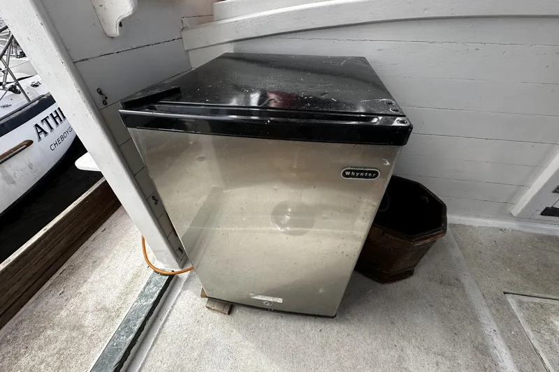Slide: The Image of Stainless steel Whynter fridge on a 2005 custom sail-assisted trawler deck. - 34
