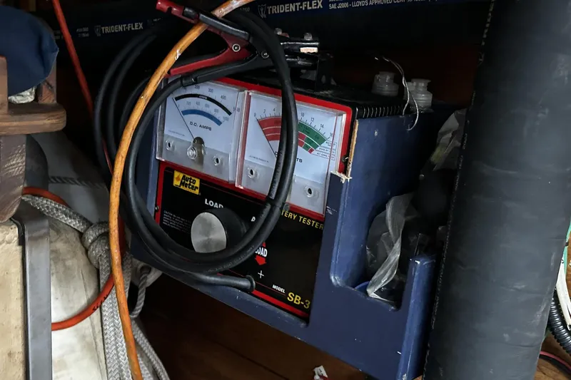 Slide: The Image of Battery tester with cables on a 2005 Custom Sail-Assisted Trawler. - 49