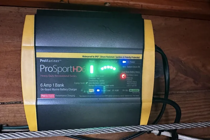 Slide: The Image of ProMariner ProSportHD6 marine battery charger on a 2005 Custom Sail-Assisted Trawler. - 51