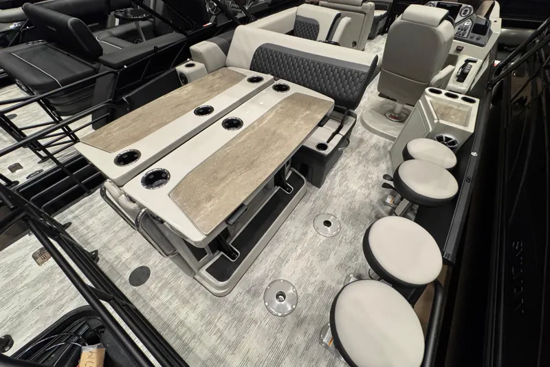 Slide: The Image of 2026 Sylvan L3 DLZ Bar interior with seating, bar stools, and modern amenities. - 11