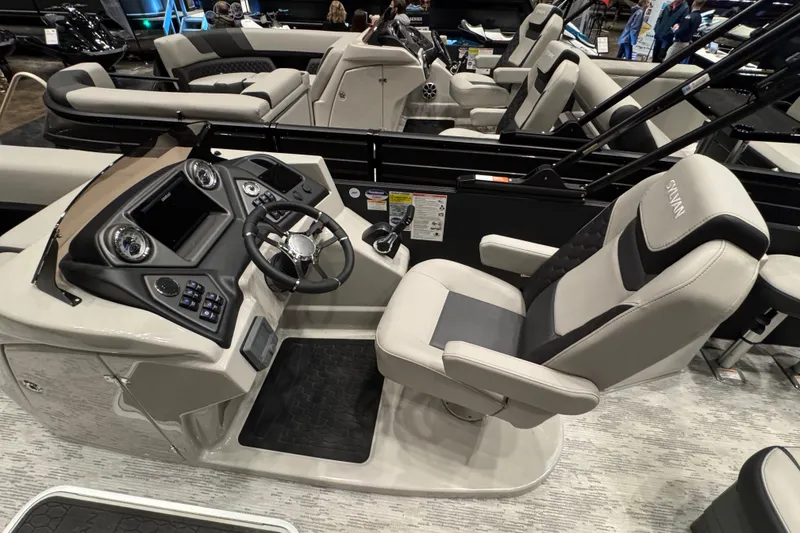 Slide: The Image of 2026 Sylvan L3 DLZ Bar boat interior with modern helm and comfortable seating. - 6