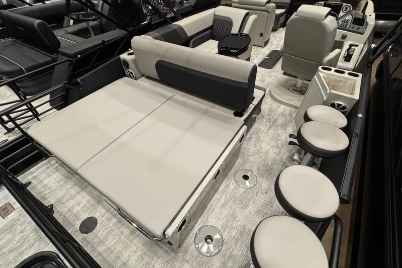 Slide: The Image of 2026 Sylvan L3 DLZ Bar interior with plush seating and modern amenities. - 8