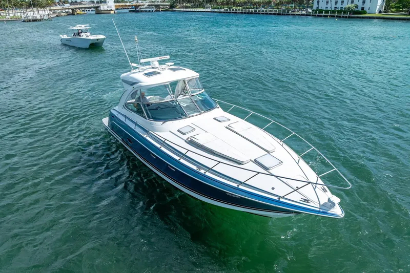 Slide: The Image of 2022 Formula 40 Performance Cruiser on clear blue water, showcasing sleek design and luxury. - 11